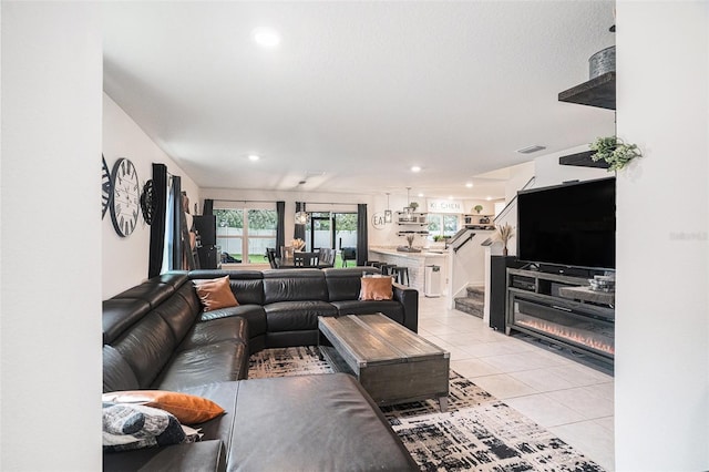 living room with light tile patterned floors