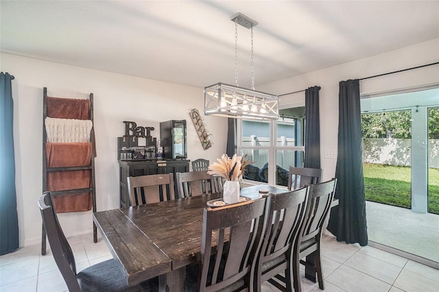 dining area featuring light tile patterned floors