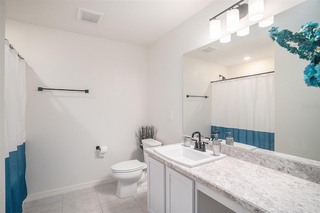 bathroom with tile patterned flooring, vanity, toilet, and a shower with curtain