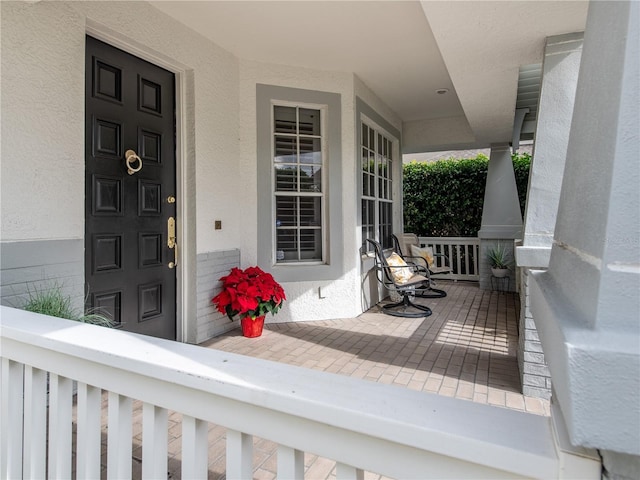 doorway to property with covered porch