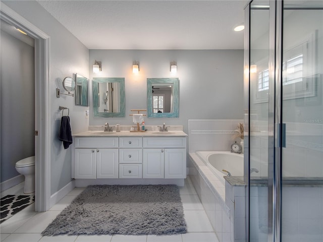 4709 Corsage Dr, Lutz, FL 33558 - bathroom with double vanity, a garden tub, tile patterned flooring, and a shower with door