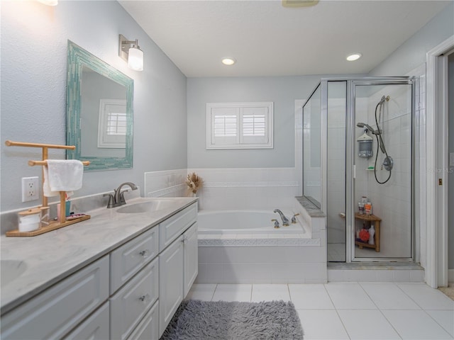 4709 Corsage Dr, Lutz, FL 33558 - full bath with a garden tub, a stall shower, double vanity, tile patterned flooring, and recessed lighting