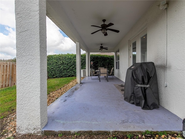 view of patio featuring grilling area and ceiling fan