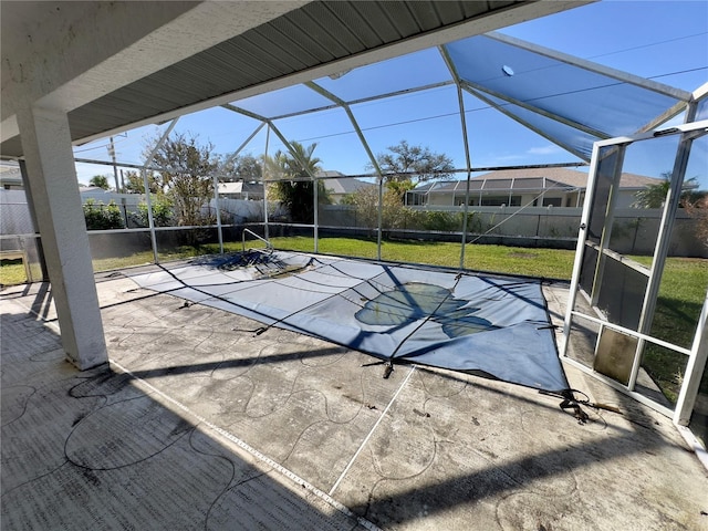 view of patio / terrace with glass enclosure