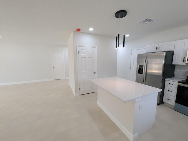 kitchen featuring electric stove, white cabinetry, a kitchen island, stainless steel fridge with ice dispenser, and decorative light fixtures