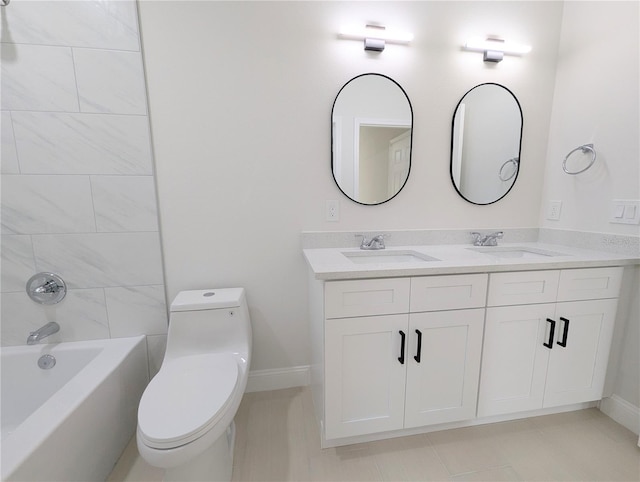 full bathroom featuring vanity, toilet, and tiled shower / bath combo