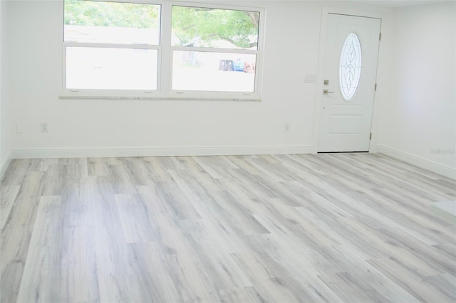 entrance foyer with light wood-type flooring