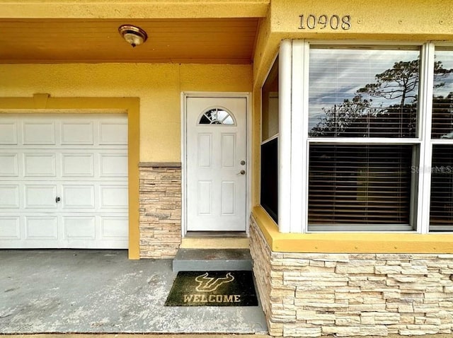 entrance to property with a garage