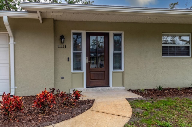 property entrance featuring a porch