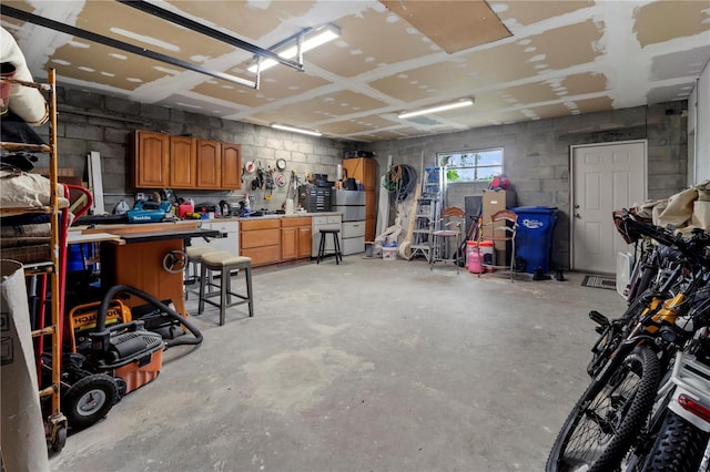 garage with a workshop area