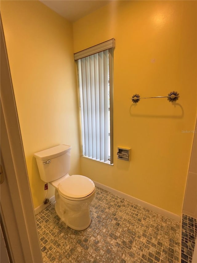 bathroom featuring toilet