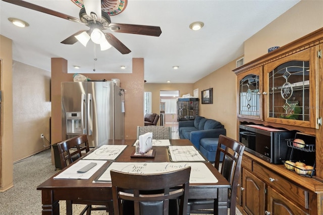 dining room featuring ceiling fan