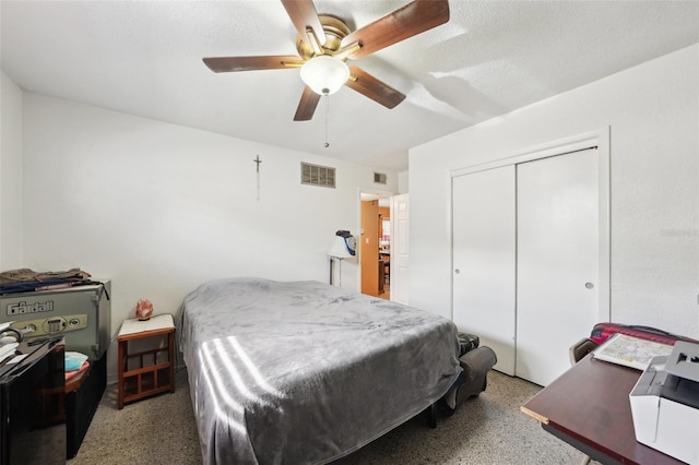 bedroom featuring a closet and ceiling fan