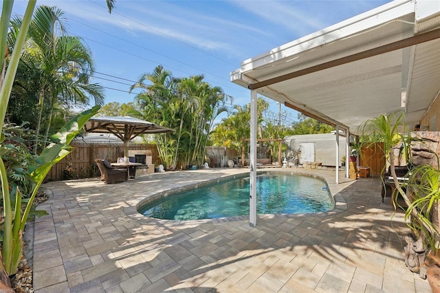 view of swimming pool featuring a patio