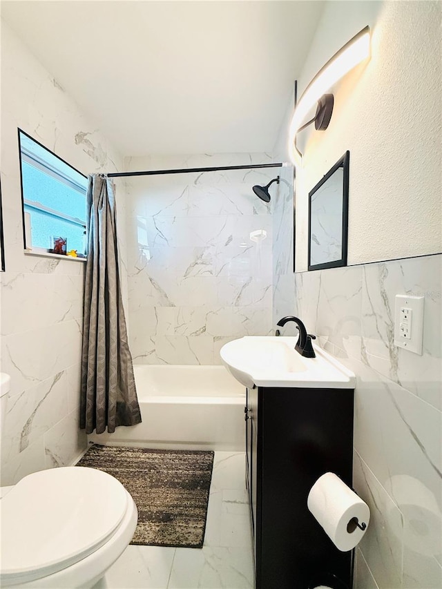 full bathroom featuring vanity, toilet, tile walls, and shower / bath combo with shower curtain