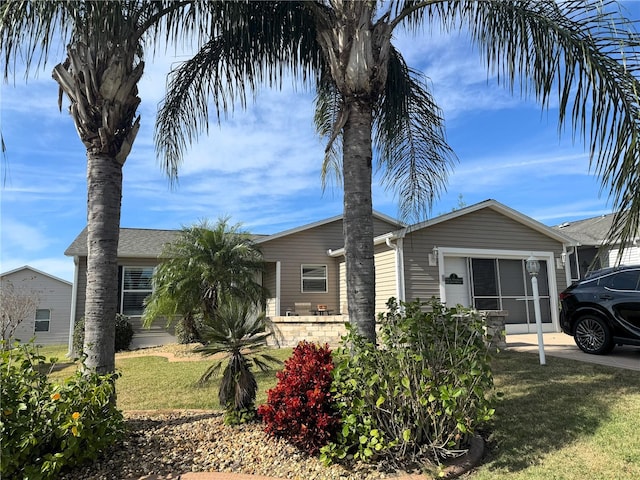 view of front of home with a front lawn