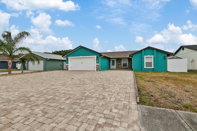 ranch-style home with a garage