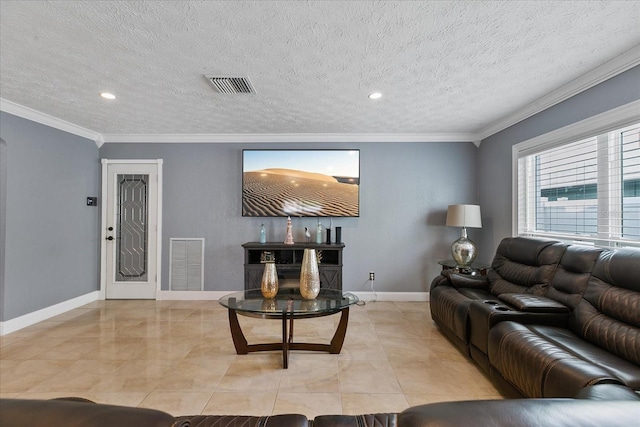 living room with ornamental molding and a textured ceiling