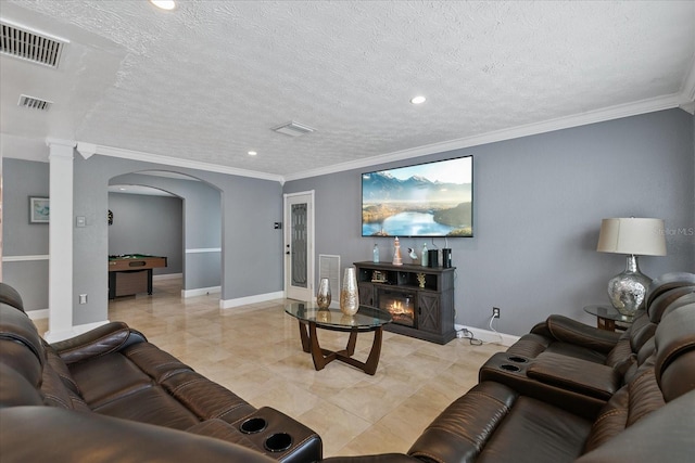 tiled living room featuring ornamental molding, a textured ceiling, and billiards