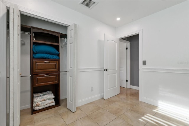 interior space with light tile patterned flooring