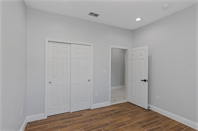 unfurnished bedroom featuring a closet