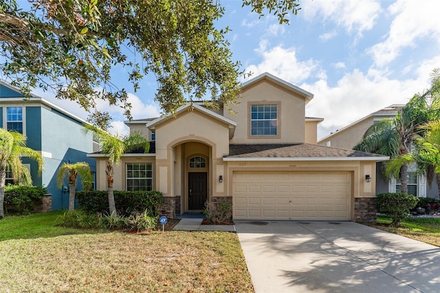 mediterranean / spanish-style house with a garage and a front lawn