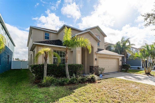 view of front facade with a garage and a front lawn