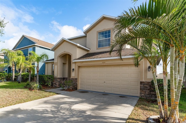 view of front of property with a garage