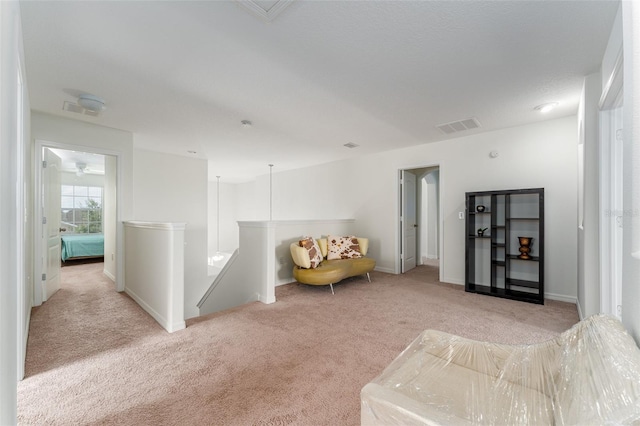 sitting room with light carpet