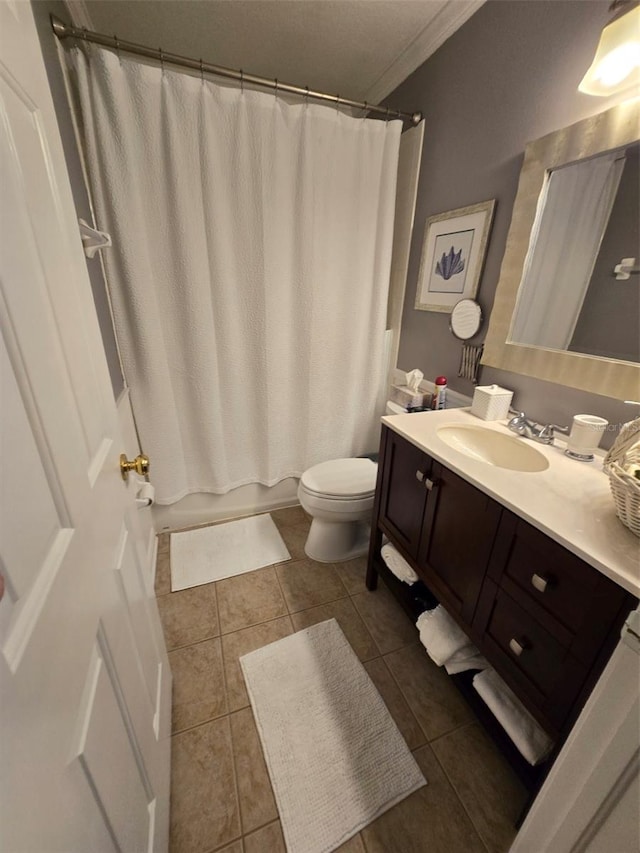 full bathroom with vanity, shower / tub combo, tile patterned floors, and toilet