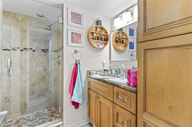 bathroom featuring vanity and walk in shower