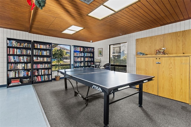 recreation room featuring wood ceiling