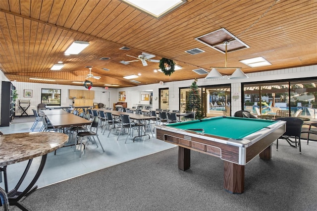 rec room featuring lofted ceiling and wooden ceiling