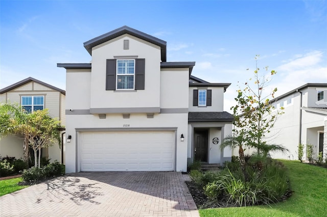 front of property with a garage