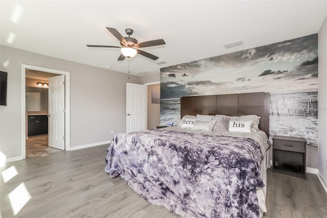 bedroom featuring ceiling fan and light hardwood / wood-style flooring