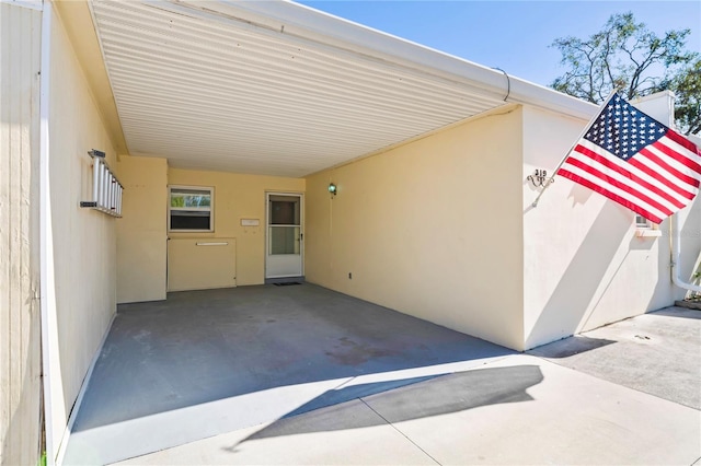 view of patio with a carport