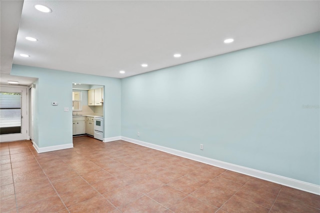 tiled empty room with sink