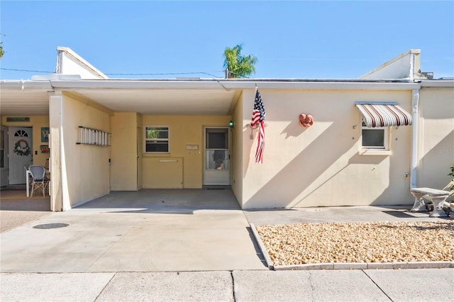 view of front of house featuring a carport