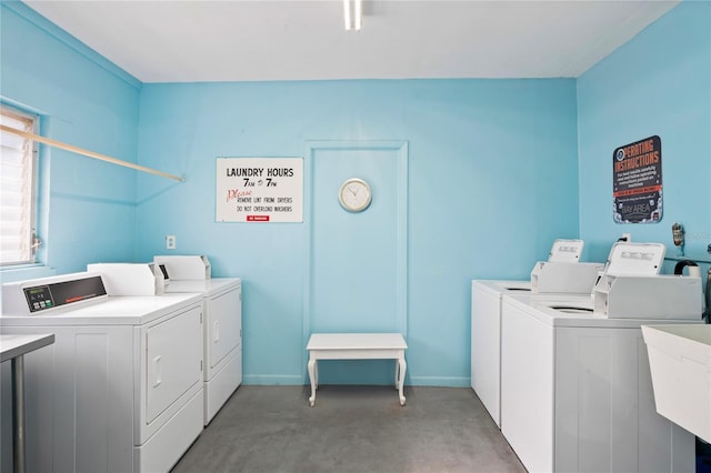 washroom featuring washer and clothes dryer