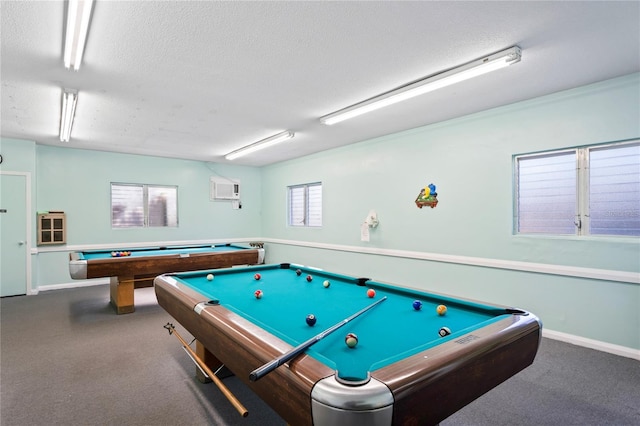 recreation room with a textured ceiling and billiards