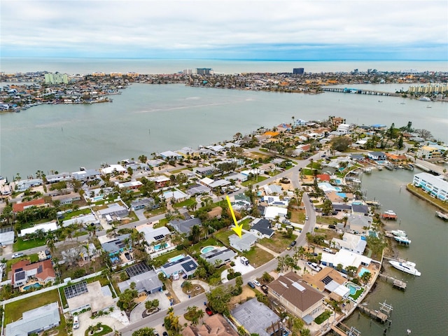 drone / aerial view with a water view