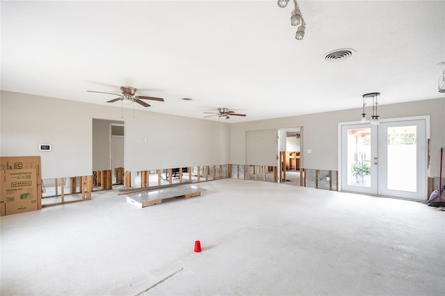 interior space featuring french doors and ceiling fan