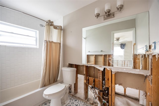 bathroom with shower / tub combo and toilet