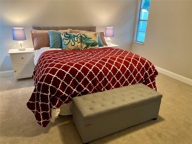6951 S Shore Dr S, South Pasadena, FL 33707 - bedroom featuring carpet flooring and baseboards