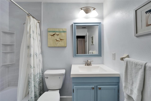 full bathroom featuring vanity, toilet, and shower / tub combo with curtain