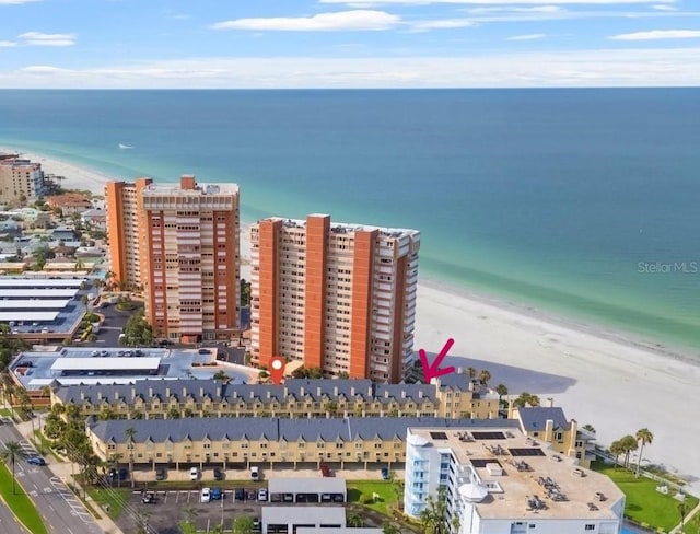 aerial view featuring a view of the beach and a water view