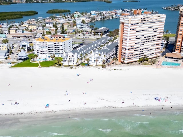 aerial view featuring a view of the beach and a water view