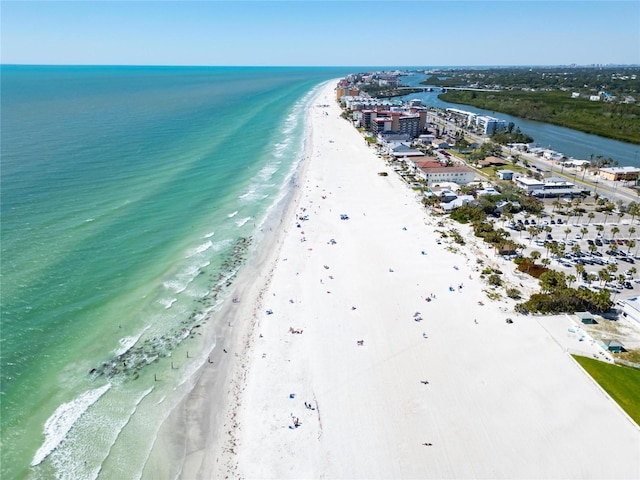 bird's eye view with a beach view and a water view