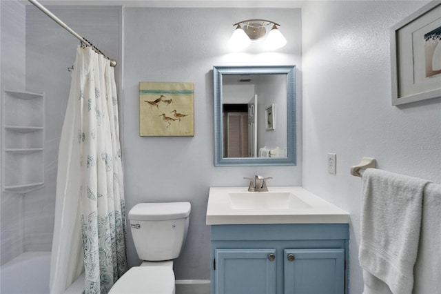 bathroom with toilet, shower / bath combination with curtain, and vanity