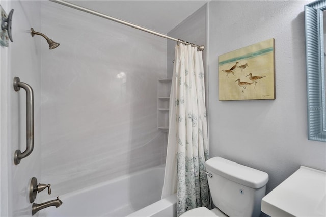 bathroom with shower / bath combo with shower curtain and toilet